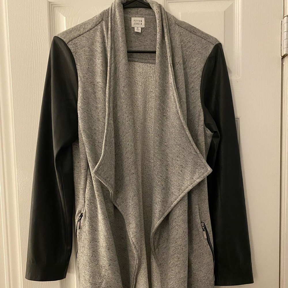 Grey sweater with faux black leather sleeves